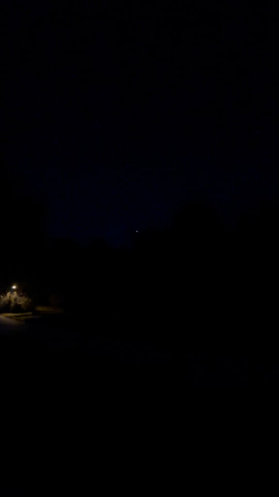I recorded a UFO flying right over my neighborhood in the front of my house. Recorded on my iPhone 13 Pro Max. Made zero noise, Alternating lights. Charlotte, NC. October 19th, 2024 @ 1:05am