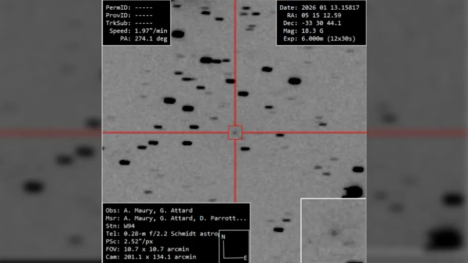 Black and white image of the comet taken during discovery