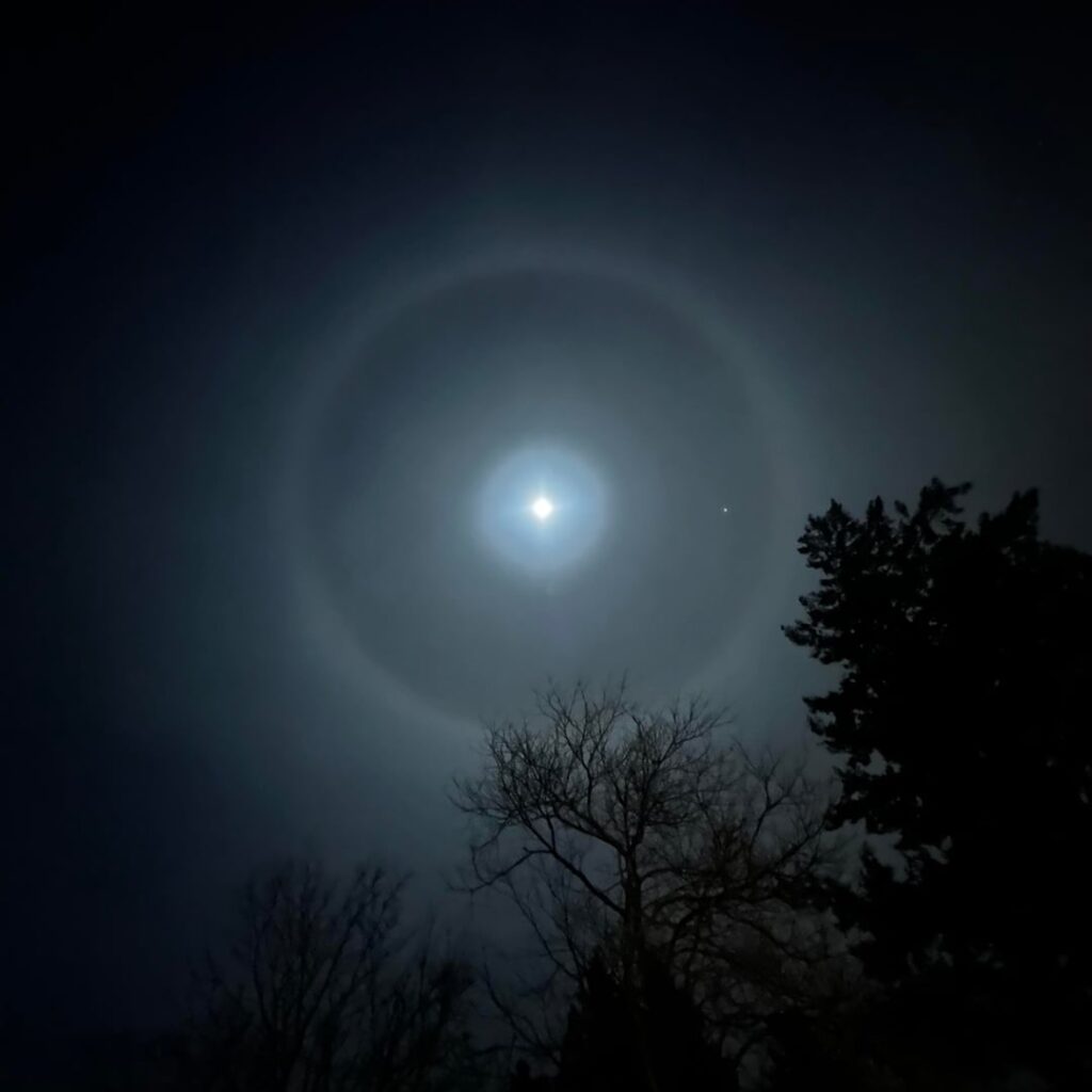 Can anybody tell me what this ring around the moon is?