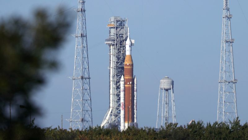 NASA opts to roll back moon rocket and delay crew’s historic trip into deep space