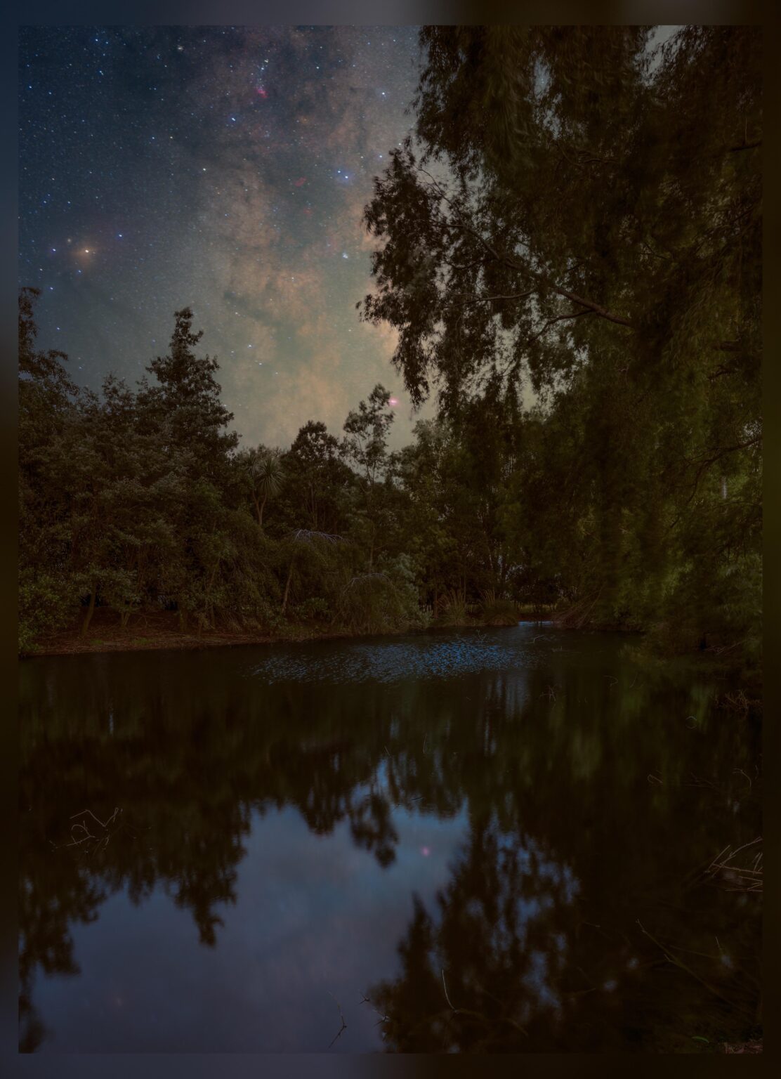 Milky Way over a quiet pond in Southland NZ