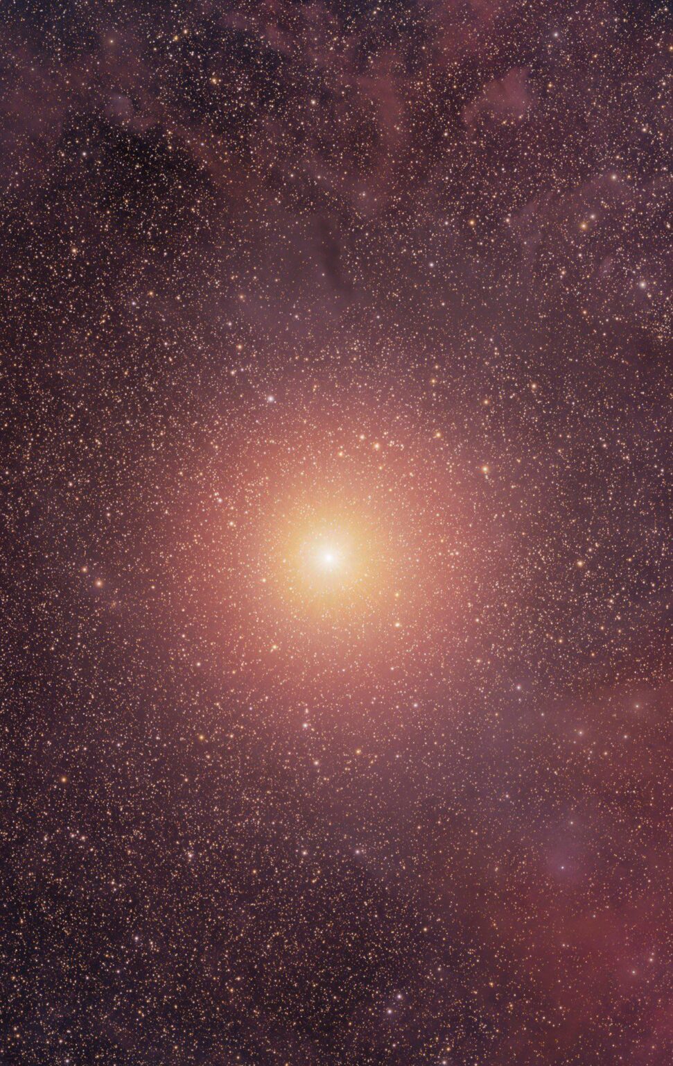 Betelgeuse shining brightly through the dust of the Orion spur. By Andrew McCarthy