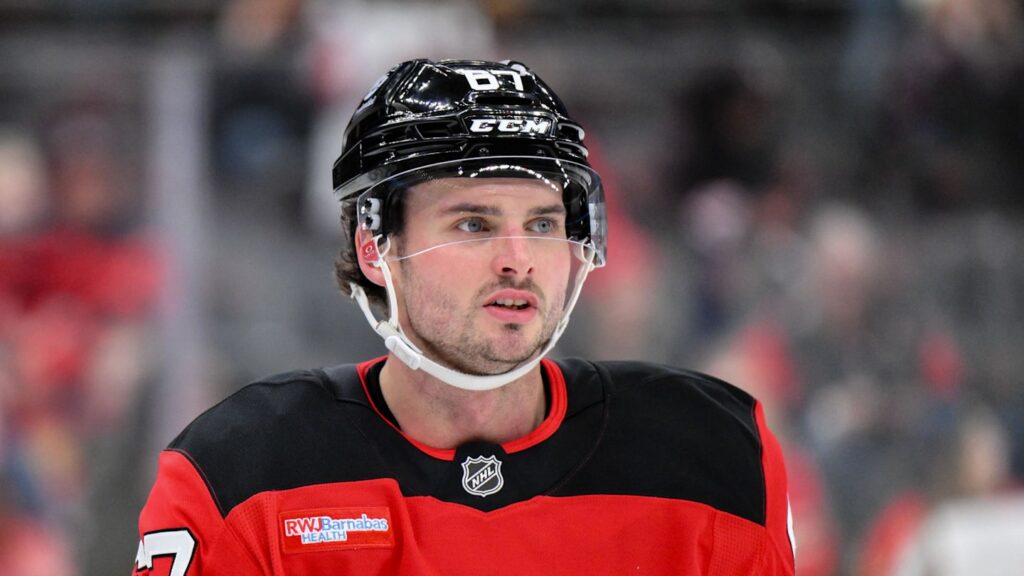 Dec 14, 2025; Newark, New Jersey, USA; New Jersey Devils center Xavier Parent (67) warms up before a game against the Vancouver Canucks at Prudential Center. Mandatory Credit: John Jones-Imagn Images