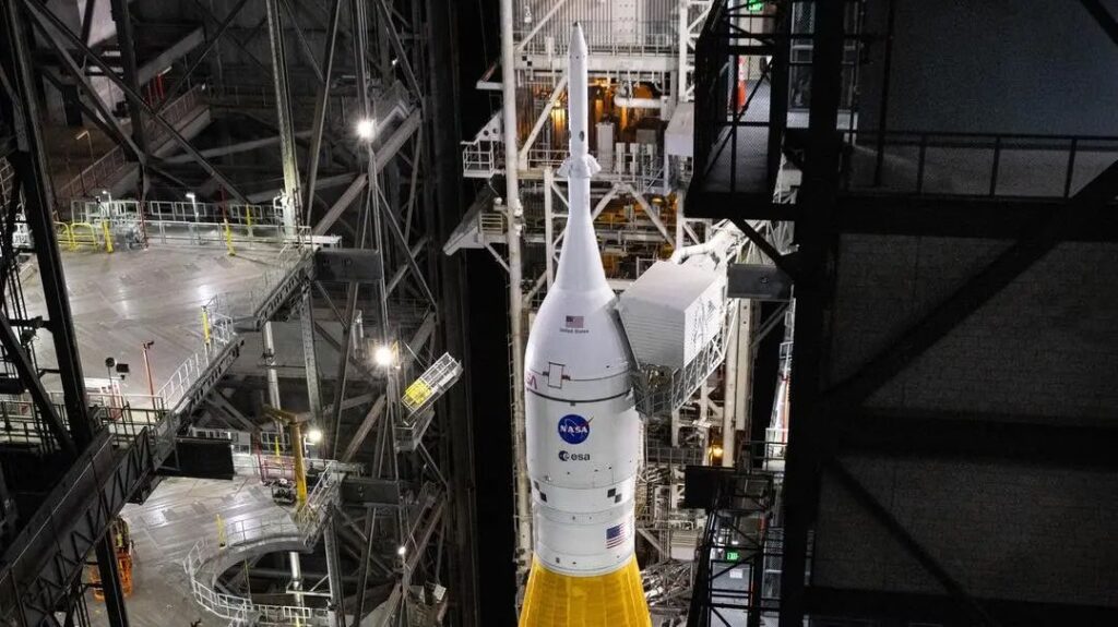 "NASA’s crawler-transporter 2, carrying NASA’s Artemis II SLS (Space Launch System) rocket with the Orion spacecraft, arrives Wednesday, Feb. 25, 2026, inside the Vehicle Assembly Building at NASA’s Kennedy Space Center in Florida to troubleshoot the flow of helium to the rocket’s upper stage," NASA explained. (NASA)
