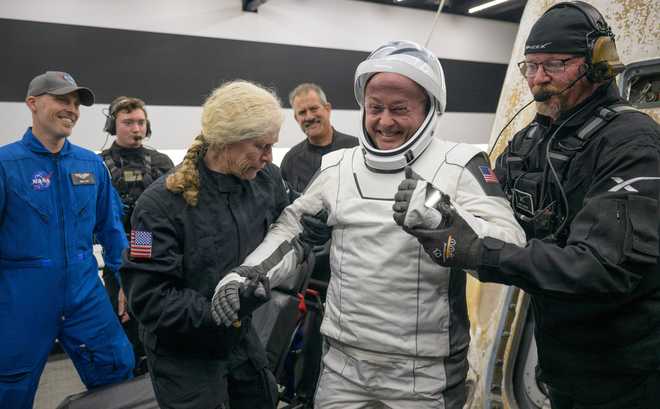 FILE - In his image provided by NASA, NASA astronaut Mike Fincke is helped out of the SpaceX Crew-11 capsule after they re-entered the Earth in a middle-of-the-night splashdown near San Diego, Calif., Thursday, Jan. 15, 2026. (Bill Ingalls/NASA via AP, File) FILE - In his image provided by NASA, NASA astronaut Mike Fincke is helped out of the SpaceX Crew-11 capsule after they re-entered the Earth in a middle-of-the-night splashdown near San Diego, Calif., Thursday, Jan. 15, 2026. (Bill Ingalls/NASA via AP, File)