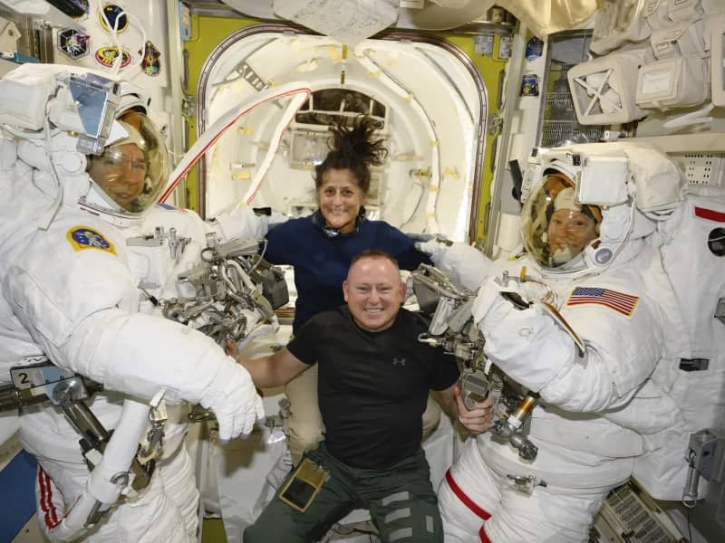 Boeing crew flight test astronauts Suni Williams and Butch Wilmore, center, pose with Expedition 71 flight engineers Mike Barratt, left, and Tracy Dyson, both NASA astronauts. (CREDIT: NASA)