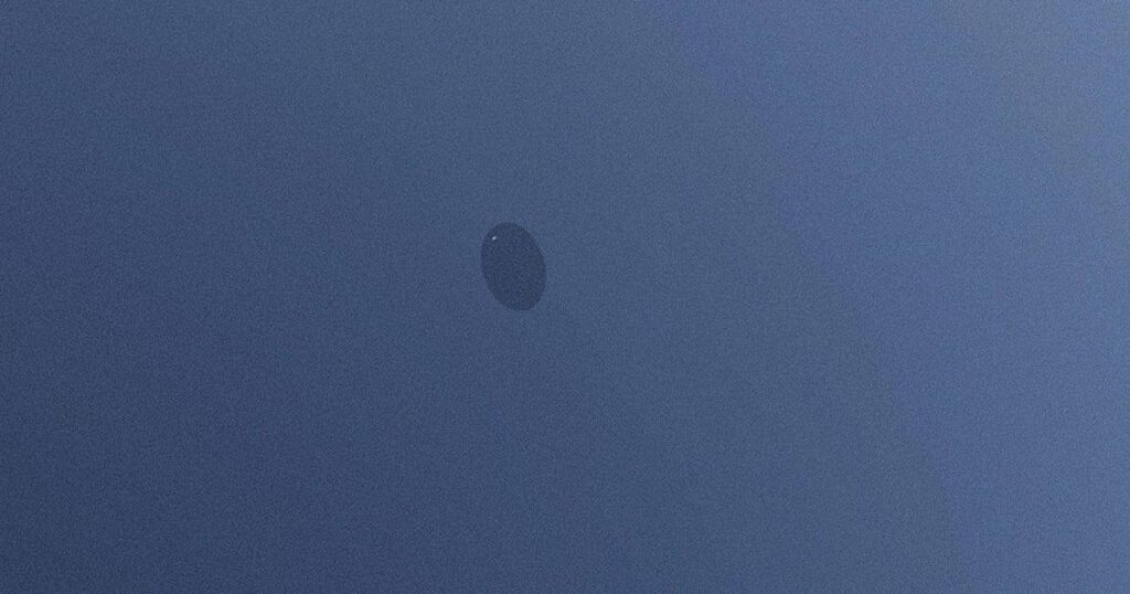 'Humming' UFO seen hovering over major UK city before disappearing with 'a pop'