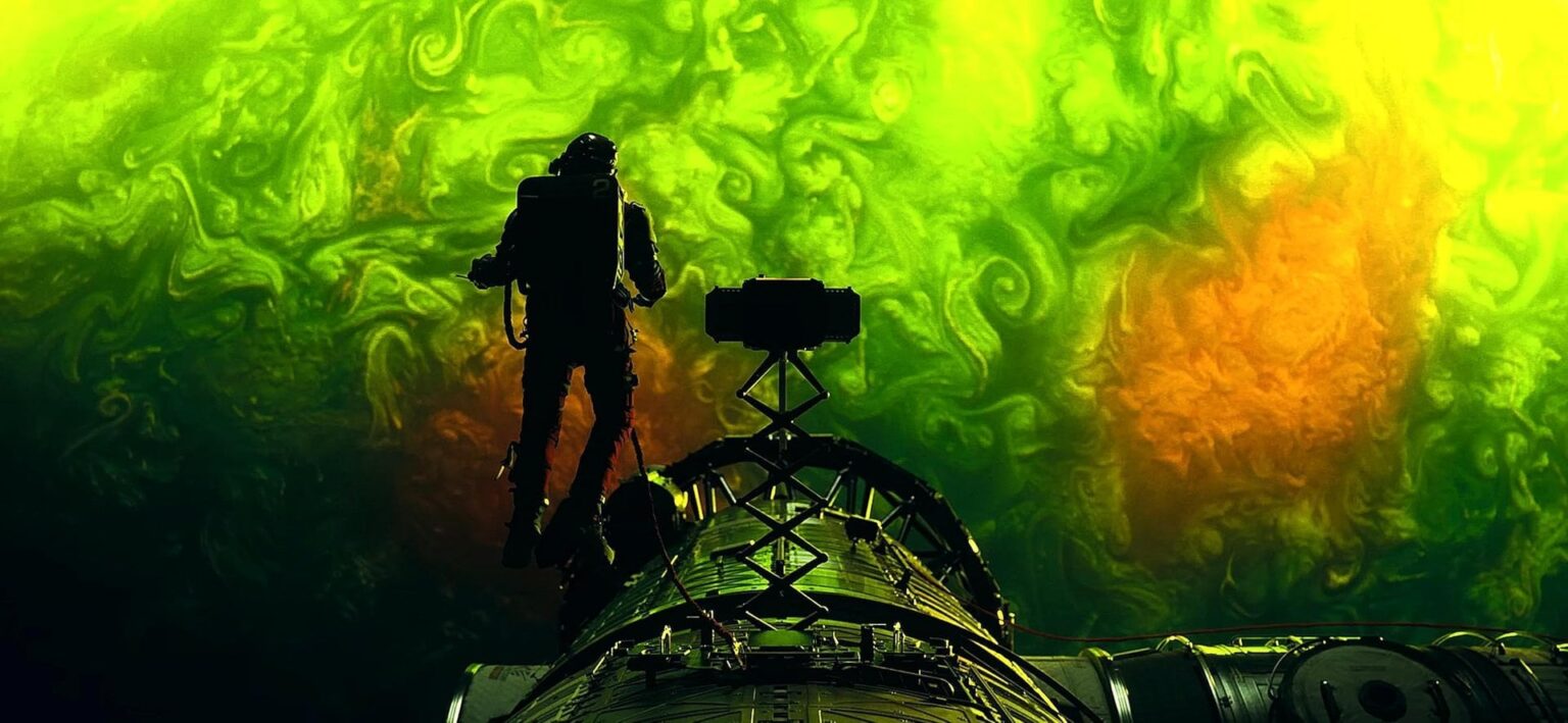 An astronaut ventures outside his ship near an alien planet in "Project Hail Mary." (Sony Pictures / Amazon MGM)