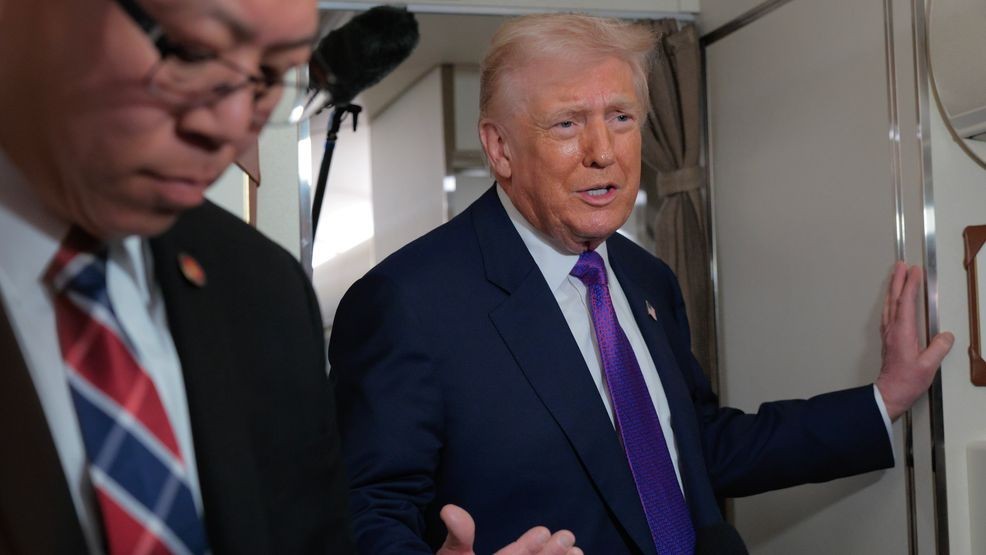 President Donald Trump talks to reporters on board Air Force One on February 19, 2026, at Joint Base Andrews, Maryland. (Photo by Chip Somodevilla/Getty Images)
