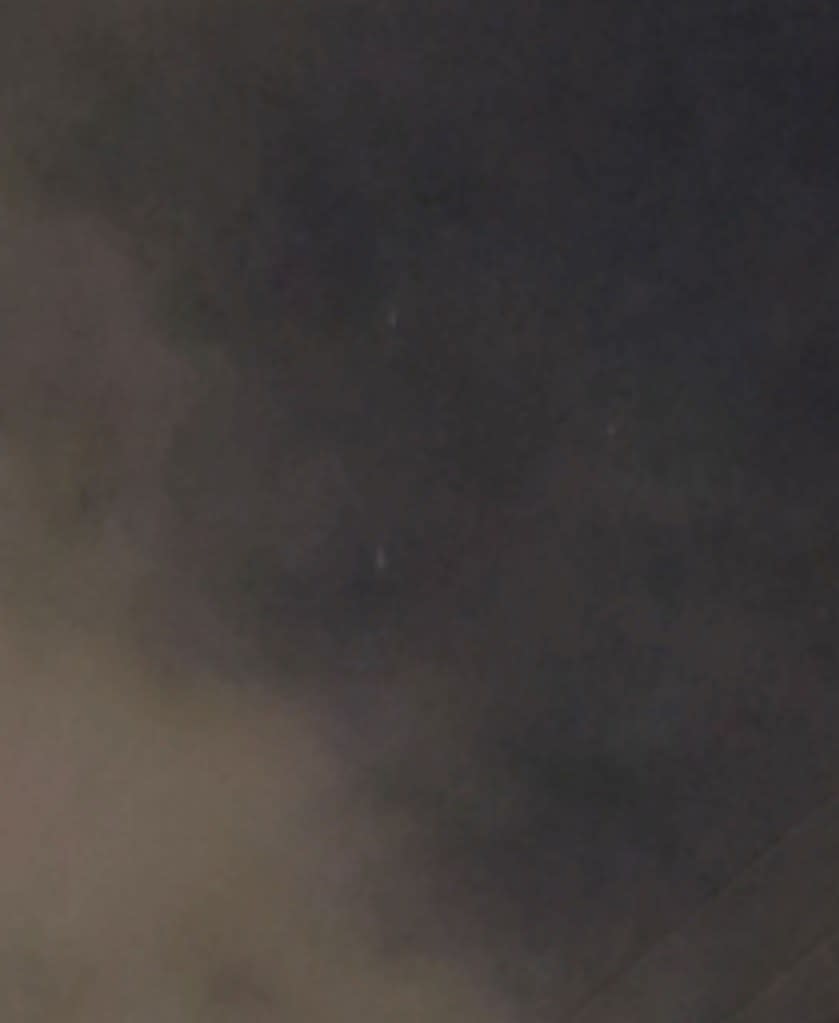 The faint orbs stood still over NYC for a few seconds before darting away into the darkness. Reddit/u/Chewy718