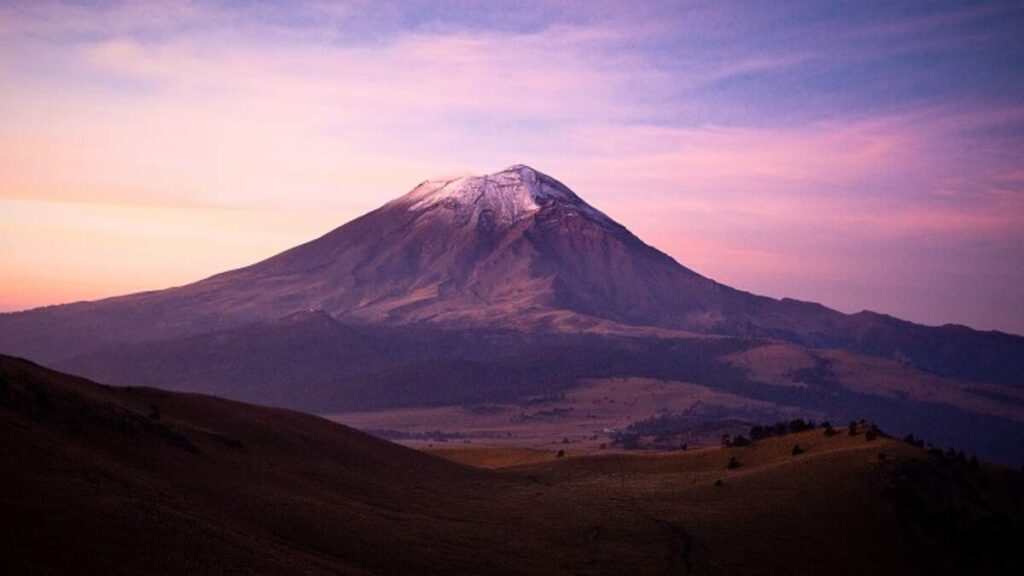 Watch: Cylindrical UFO Filmed Flying Between Volcanoes in Mexico