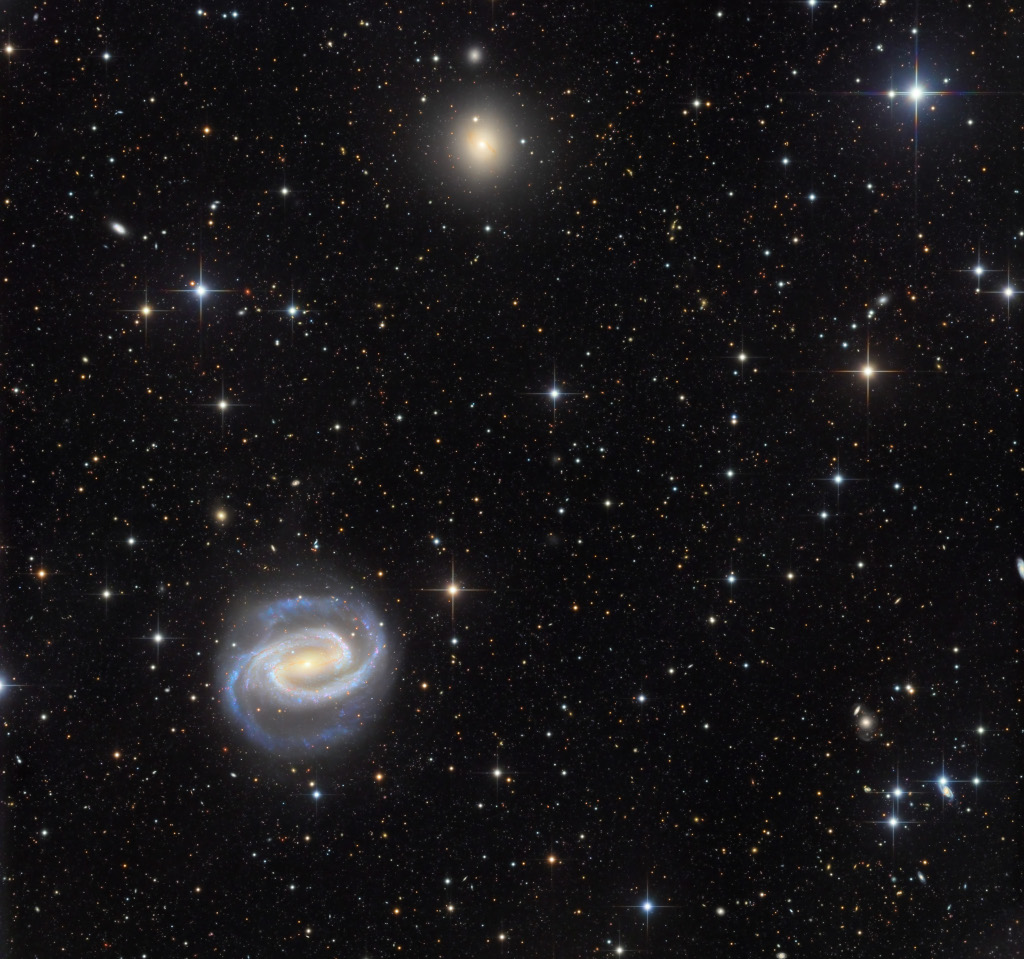 NGC 1300 and NGC 1297 See Explanation. Clicking on the picture will download
the highest resolution version available.