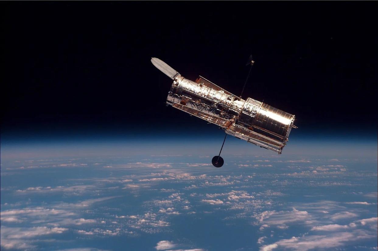 Hubble in Earth's orbit.