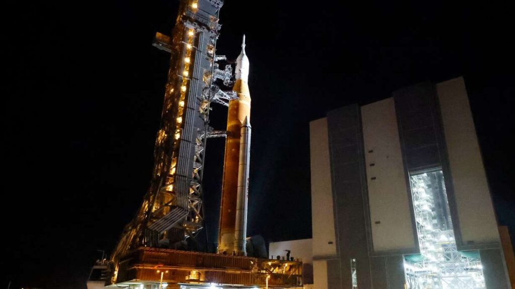 NASA hauls repaired moon rocket from hangar back to pad for early April launch