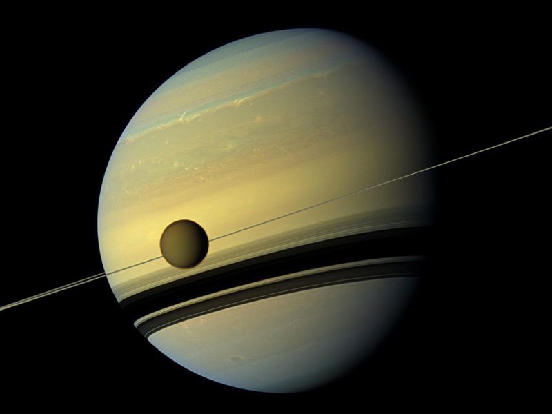 NASA’s Cassini spacecraft’s best images of Saturn and its moons Moon Titan appears in front of Saturn in an image captured by NASA’s Cassini spacecraft. Credit: NASA/JPL-Caltech/Space Science Institute