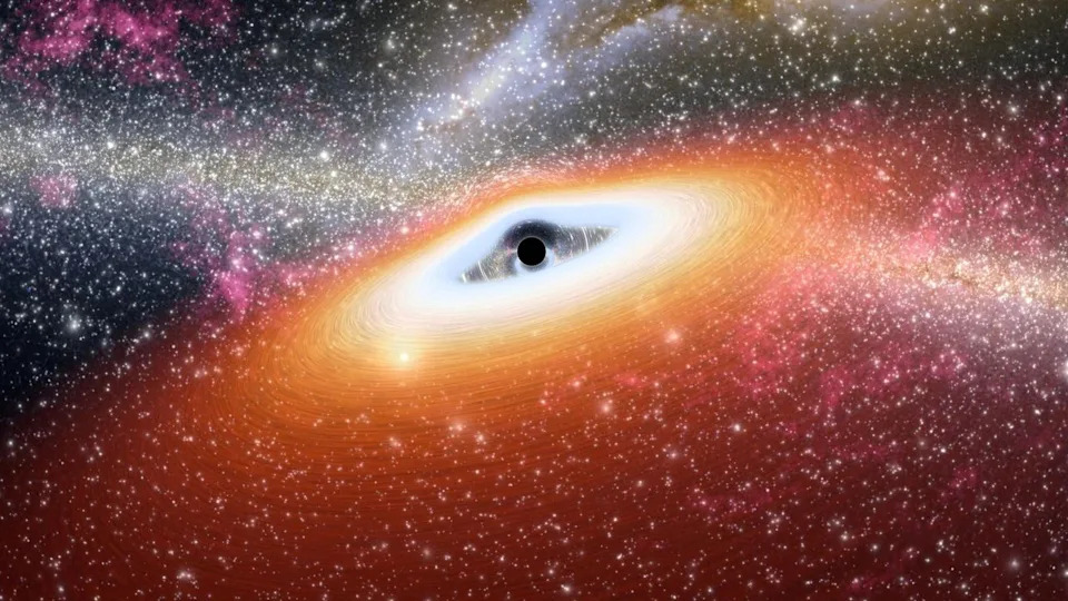 An artist's illustration of a black hole in yellow, blue and pink light. 