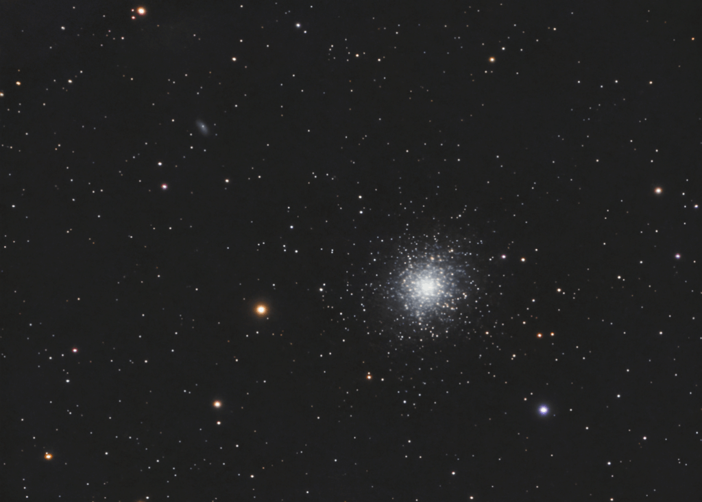 Star cluster and a galaxy in the same frame Star cluster and a galaxy in the same frame