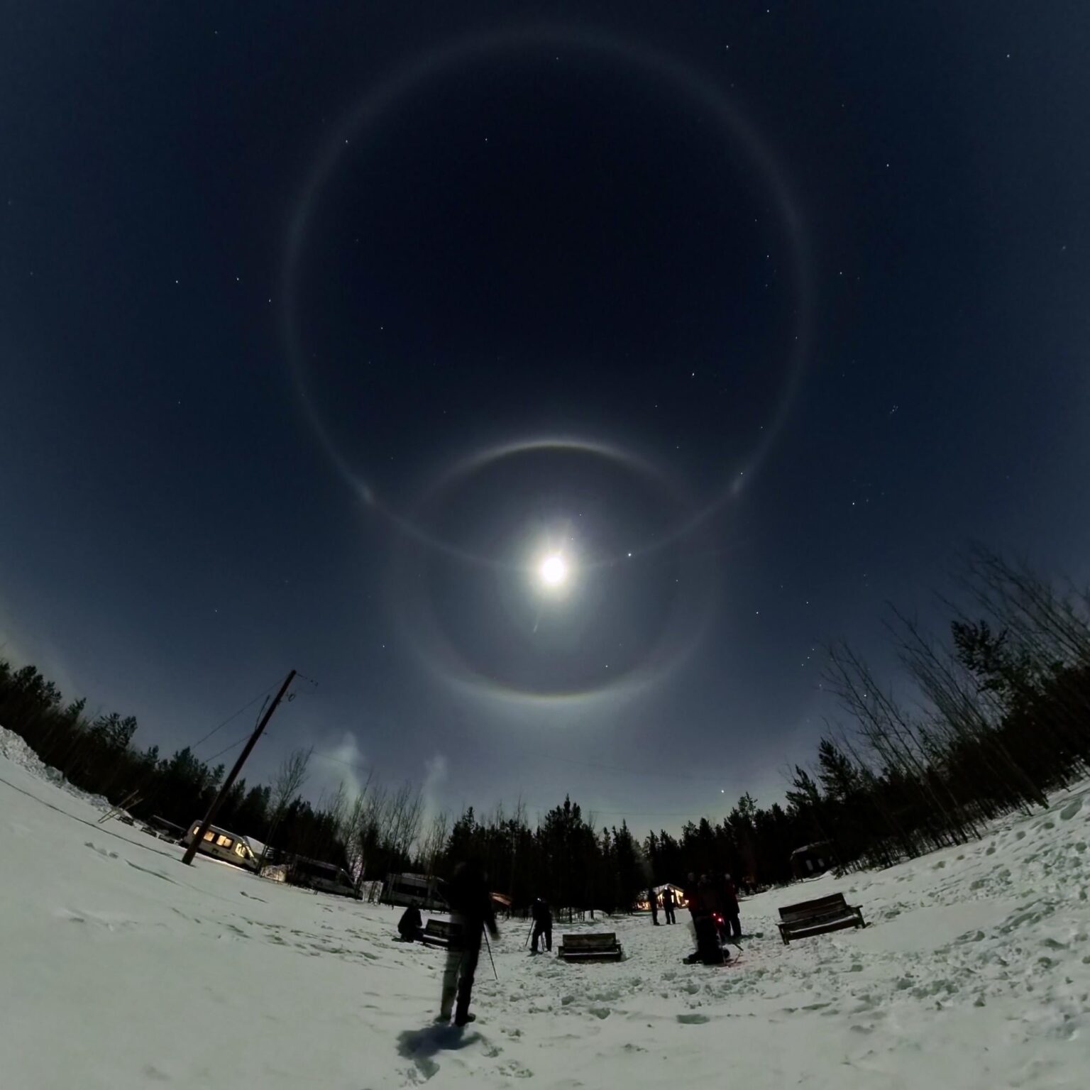 Paraselenae, Paraselenic Circle, 22° Halo, and Auroras in the Yukon Territory, Canada