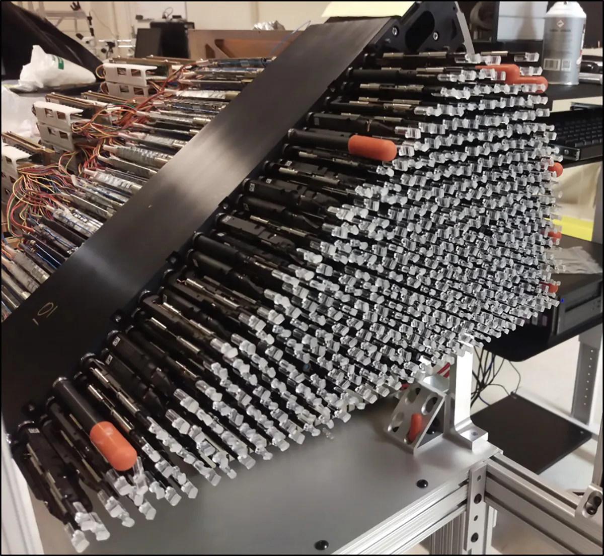 The first of 10 wedge-shaped petals for DESI, stocked with 500 slender robotic positioners. These each swivel independently to gather light from targets including galaxies and quasars. © 2010-2019 The Regents of the University of California, Lawrence Berkeley National Laboratory.