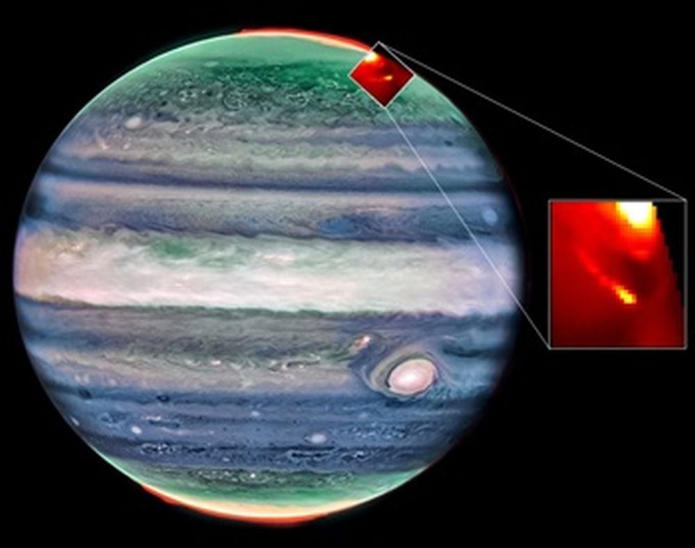 This image shows the two auroral footprints in Jupiter's aurora borealis created by the moons Io and Europa. The JWST observed these footprints and provided the first spectral measurements. These showed extreme temperature and densities in Io's footprint, a big surprise to the researchers behind the work. Image Credits: Webb/NIRCam Credit: NASA, ESA, CSA, Jupiter ERS Team; image processing by Judy Schmidt. Webb/NIRSpec Credit: Katie L. Knowles (Northumbria University).