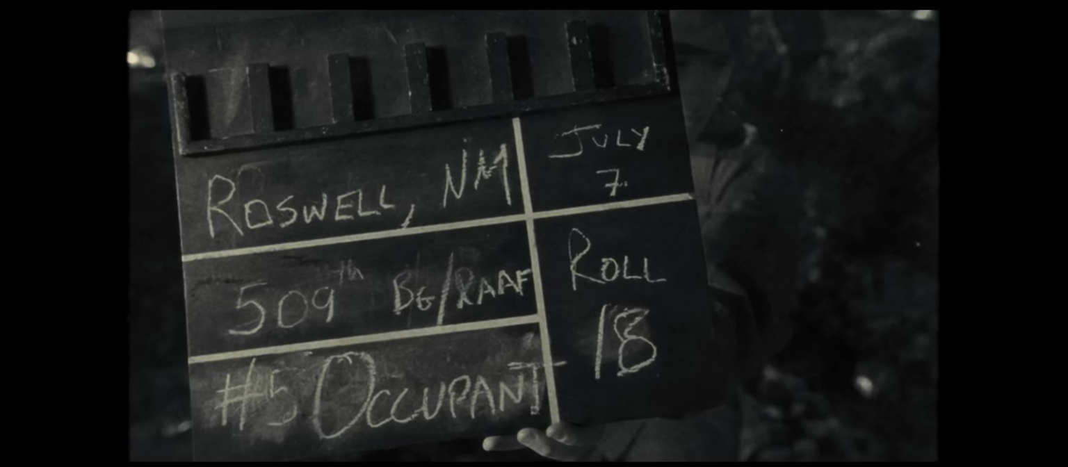 From ‘Disclosure Day’ Trailer: If you slow down the Roswell footage, it says #5 Occupant. My big swing take: On IMDB, I’ve researched the lenses and film-stock they’ve used… this might be THE actual Roswell footage (read below)