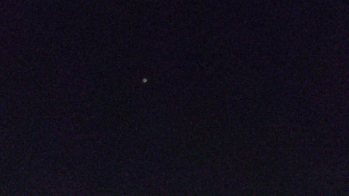 Round Rock, TX March 28th 9:13pm. Low slow flying large sphere (It was bright so it was tough to tell the exact shape). Video doesn't do it justice. No noise at all. It went over the house and just disappeared.