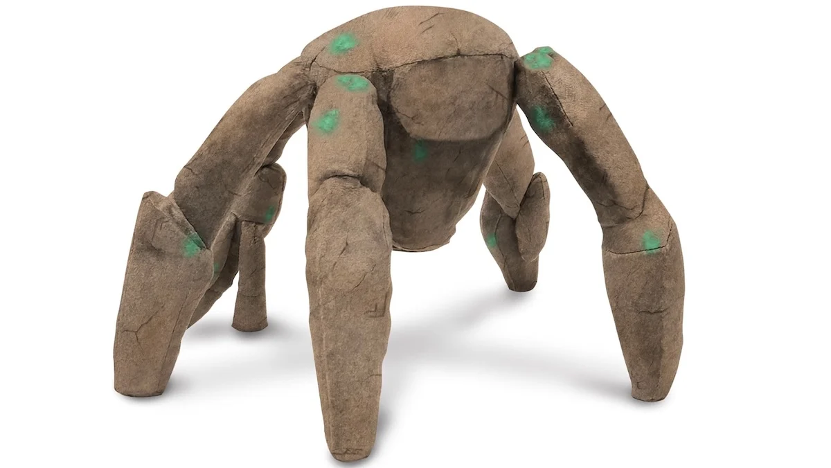 A Rocky plushie doll on a white screen from Project Hail Mary