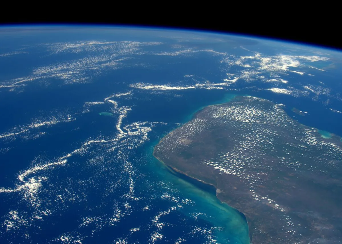 A photograph of the area where the asteroid that created the Chicxulub crater and is buried beneath the Yucatán Peninsula in Mexico. This photo was captured by astronaut Tim Peake while onboard the International Space Station.