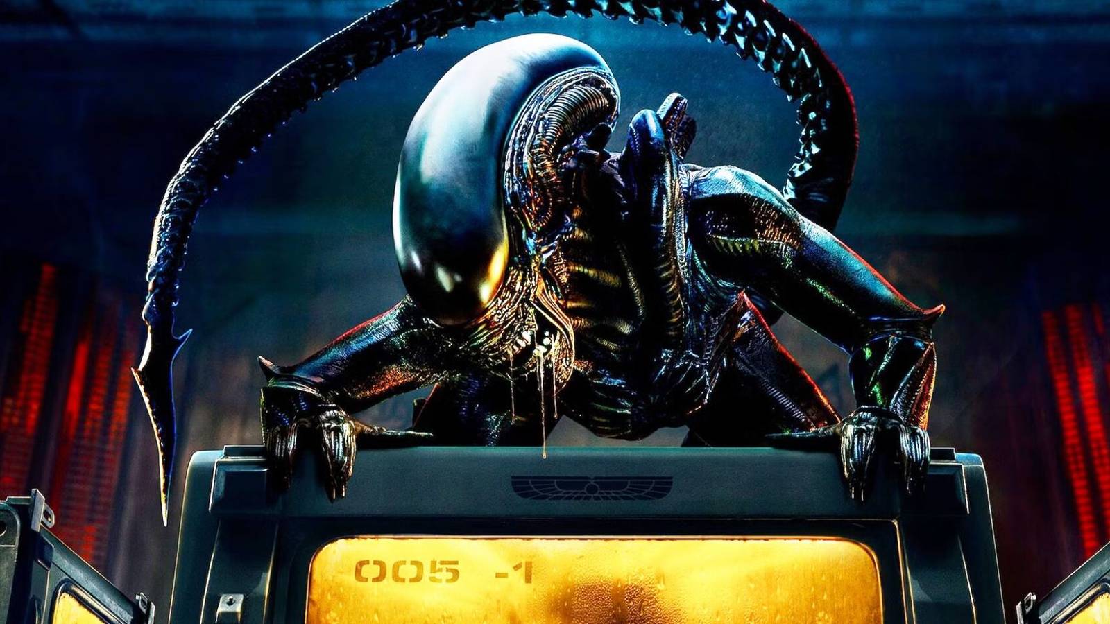 The Xenomorph in Alien: Earth snarling with drool dripping down, crouched on top of a box.