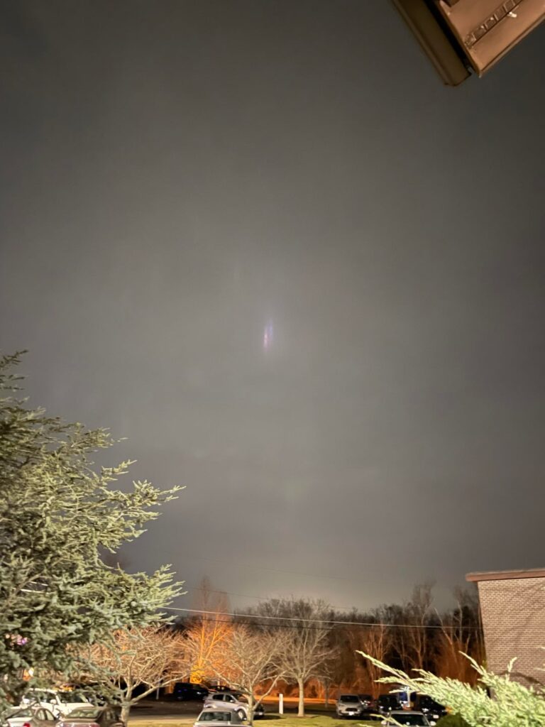 Pink and Purple glowing streaks in sky. Pink and Purple glowing streaks in sky.