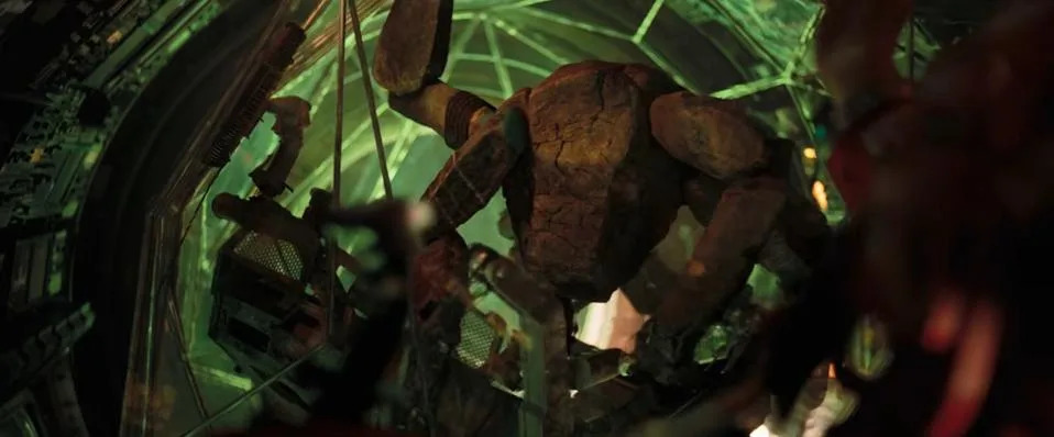 A brown, five-legged, rock-like alien