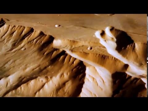 Symbols of an Alien Sky: The Lightning-Scarred Planet Mars " The high resolution images reveal massive channels and gouges, great mounds, and crater chains, none finding an explanation in traditional geology but all matching the scars from electric discharge experiments in the laboratory"