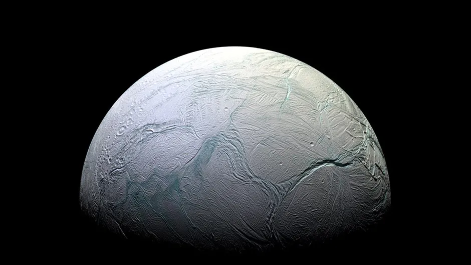 Enceladus’s cratered crust, as seen by the Cassini spacecraft. What lies below, in the moon’s subsurface ocean? Image Credit: NASA/JPL-Caltech/Space Science Institute
