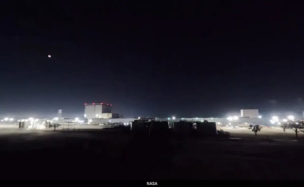 NASA Captures Stunning "Blood Moon" Over Rocket Factory