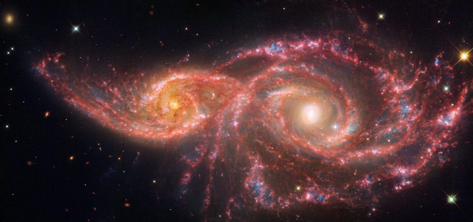 Galaxies IC 2163 and NGC 2207 (Webb and Hubble composite image)