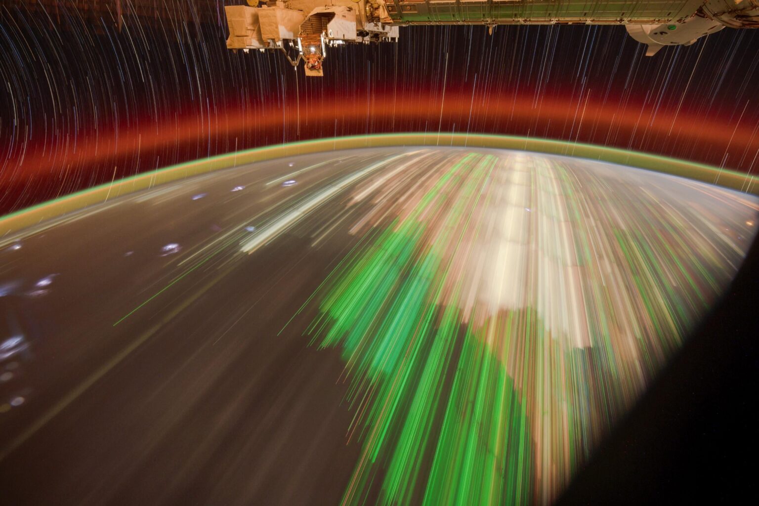 ISS star trails with fishing lights on Earth