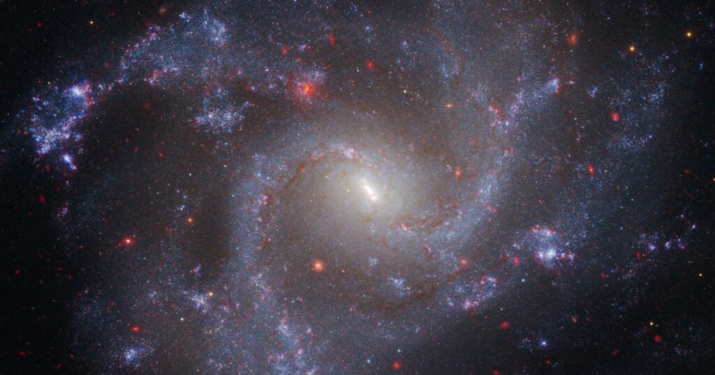 Image of galaxy NGC 5468, 130 million lightyears from Earth, combining data from the Hubble and James Webb space telescopes. It