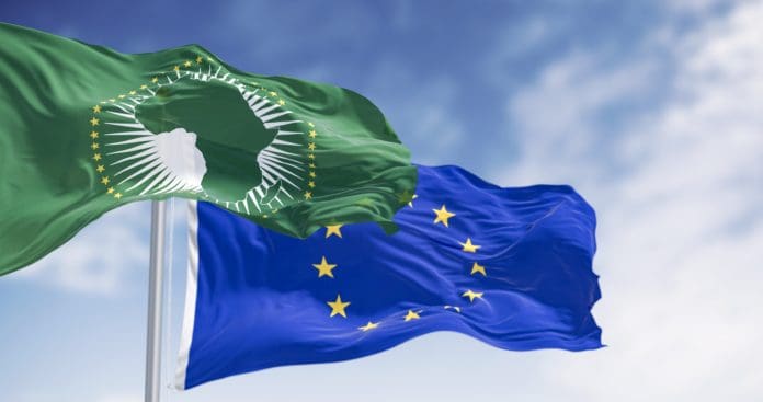 African Union and the European Union flags waving on a clear day