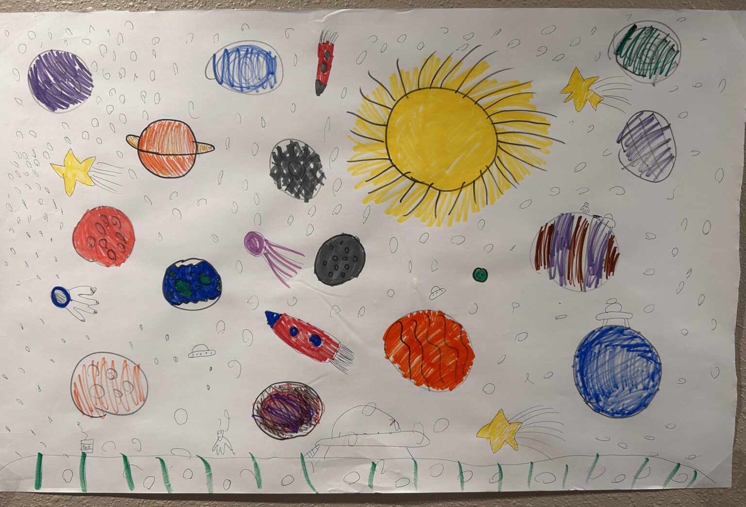 I told my 8 year old recently that I was into space and UFOs...she proceeded to draw me this masterpiece.
