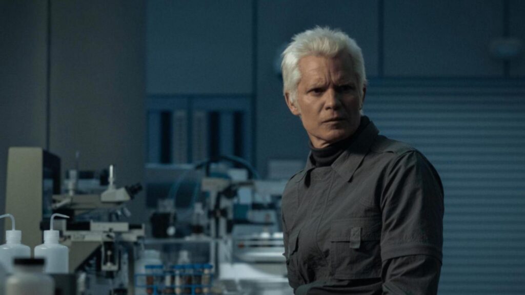 Timothy Olyphant in lab scene observing experiment tense expression Alien Earth, from Alien: Earth season 1