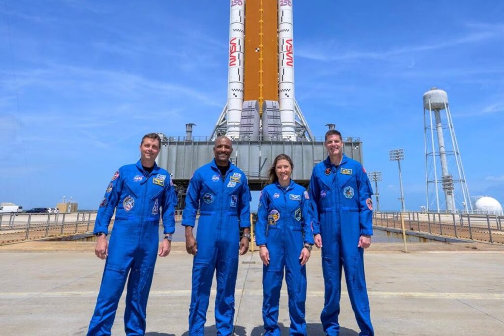 Artemis II is a ‘fundamental shift’ in spaceflight, say scientists. Why we’re entering a new era of space exploration The Artemis II crew standing in front of the Space Launch System and Orion capsule that will take them to the Moon. Credit: NASA/Bill Ingalls