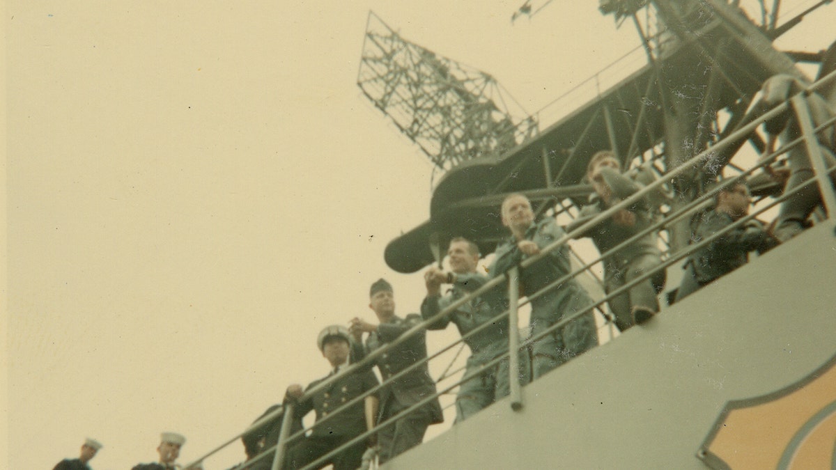 Neil Armstrong on deck of ship