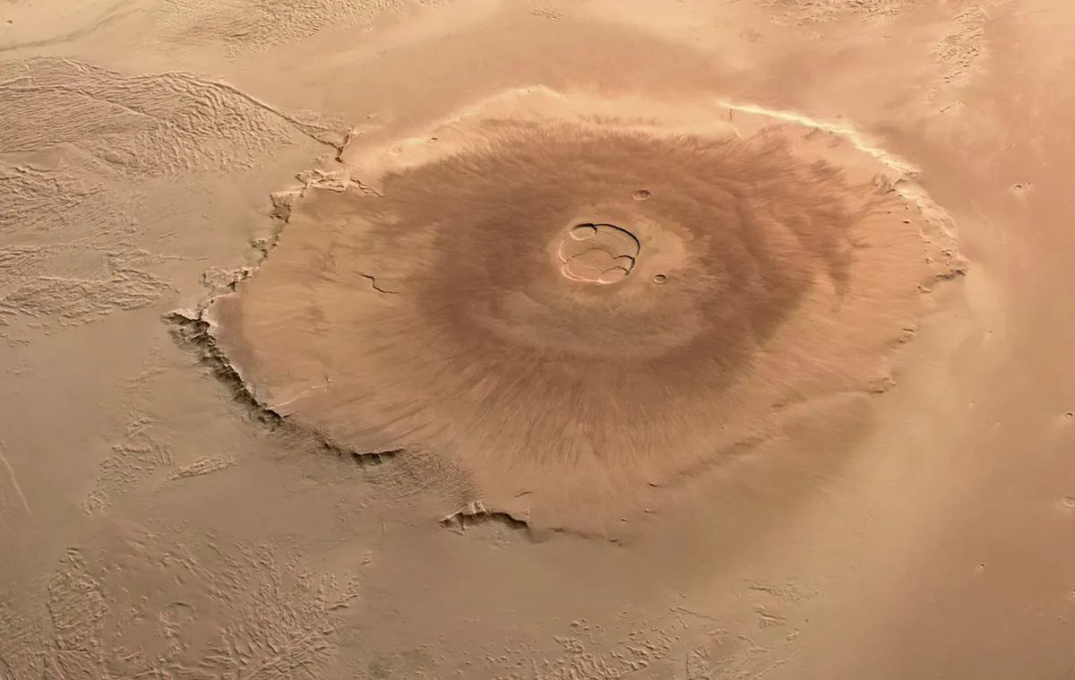 Image of Olympus Mons, the tallest and largest volcano in the Solar System, captured by ESA's Mars Express and processed by Andrea Luck. Credit: Credit: ESA/DLR/FUBerlin/AndreaLuck