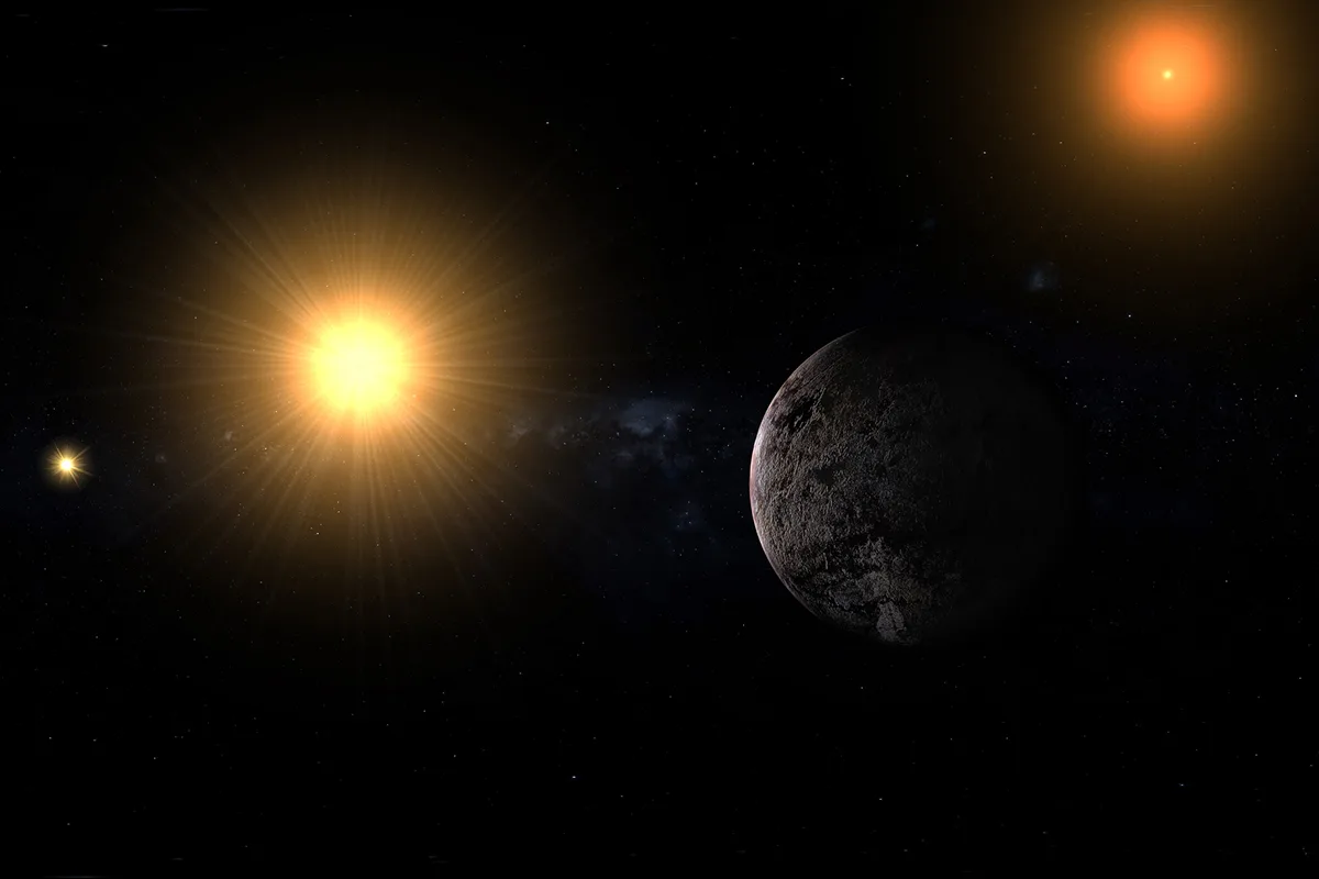 Artist impression of exoplanet Proxima Centauri b with Alpha Centauri stars and red star. Credit: Ianm35 / Getty Images