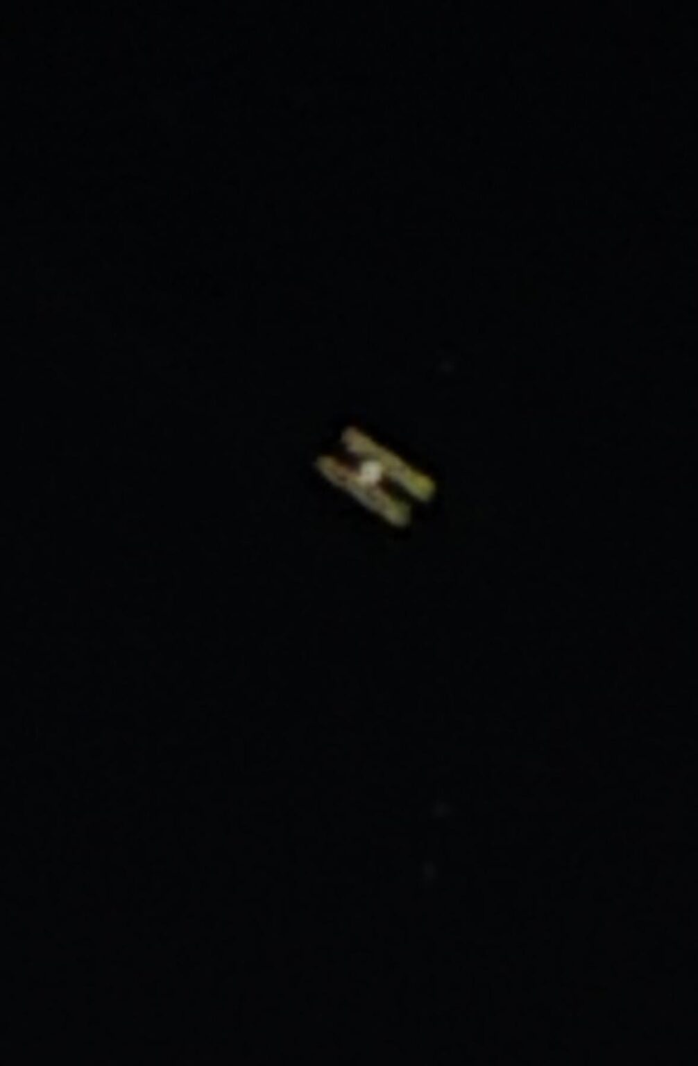 My sister sent me this picture of a satellite she found while taking photos of the Orion Nebula.