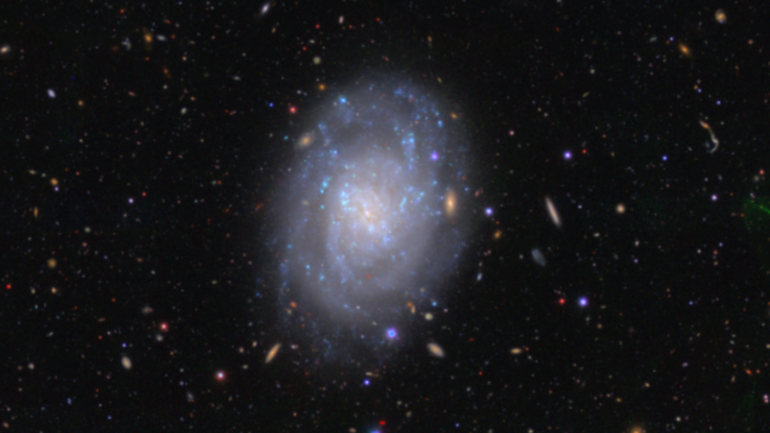 Spiral galaxy is a stunning cosmic wheel in head-turning image photo of the day for March 3, 2026