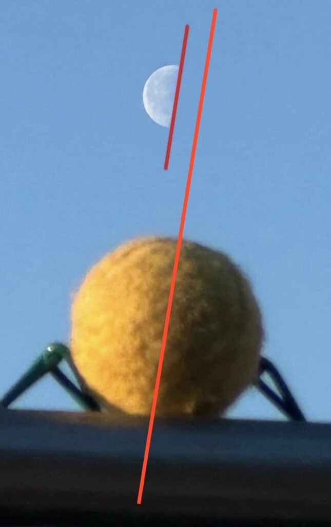 Angle of incidence of sunlight on the moon and a ball on earth - with a line accurately marking the edge of the shadow on the ball.