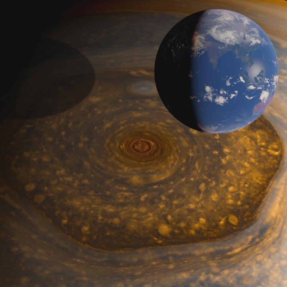 The giant hexagonal storm at Saturn's north pole, with the Earth for scale by Paul Byrne
