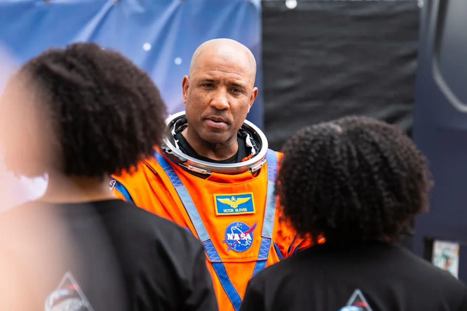 NASA Astronaut Victor Glover bids farewell to his family during the traditional crew walkout before heading to the launch pad at Kennedy Space Center in Florida, United States, on [Month Day, Year]. The Artemis II mission, which launched from Kennedy Space Center, carries four astronauts on a trip around the Moon for the first time in over 53 years. <p>&lpar;Photo by Manuel Mazzanti&sol;NurPhoto via Getty Images&rpar;</p>