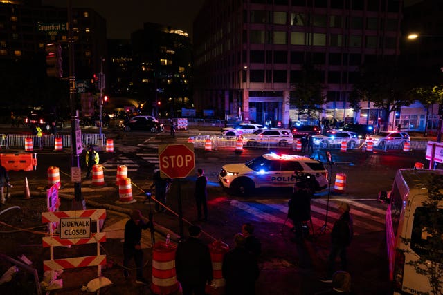 Law enforcement respond to an incident at the Washington Hilton during the White House Correspondents Dinner in Washington
